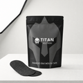 Titan Recovery bamboo silk mouth tape in a black resealable pouch with a single black mouth tape pad placed in front on a white surface.